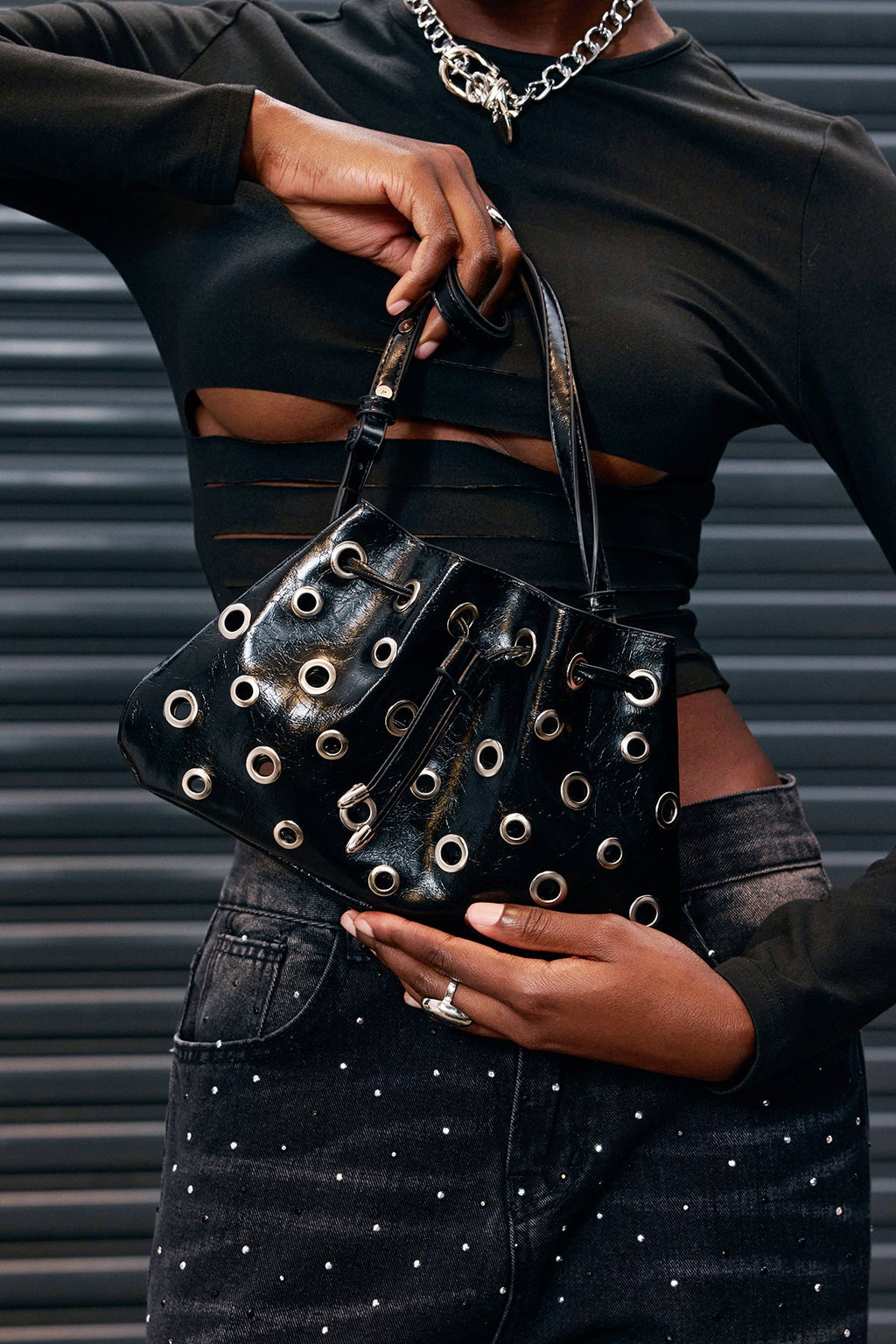 Aponi Metal Ring Cutout Leather Bag