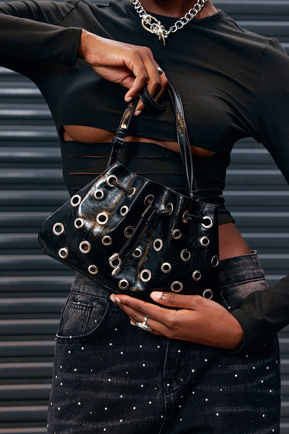 Aponi Metal Ring Cutout Leather Bag