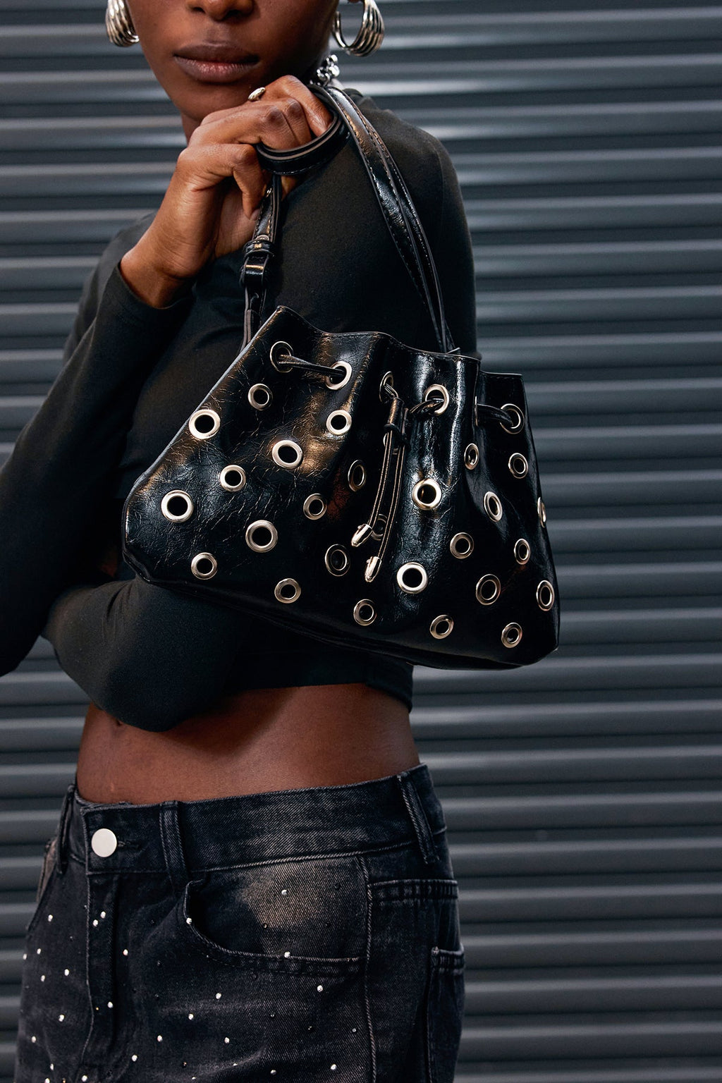 Aponi Metal Ring Cutout Leather Bag