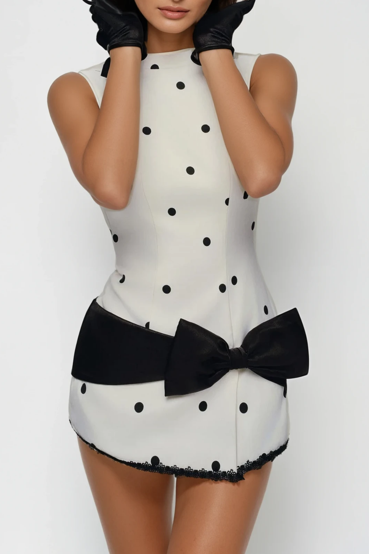 Deja Sleeveless Dot Bow Mini Dress