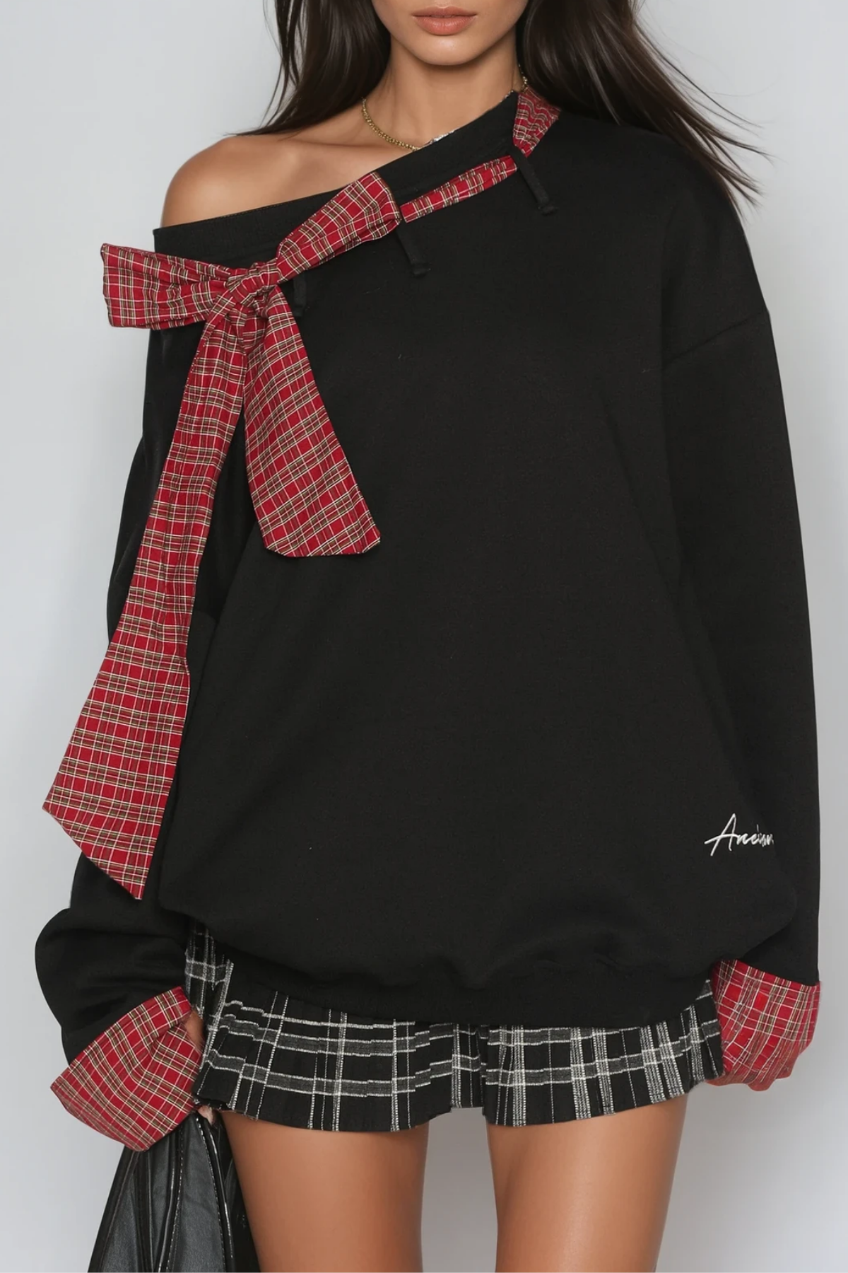 Derrick Grid Bow Asymmetric Top In Black