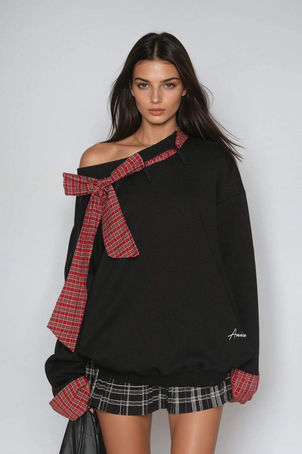 Derrick Grid Bow Asymmetric Top In Black